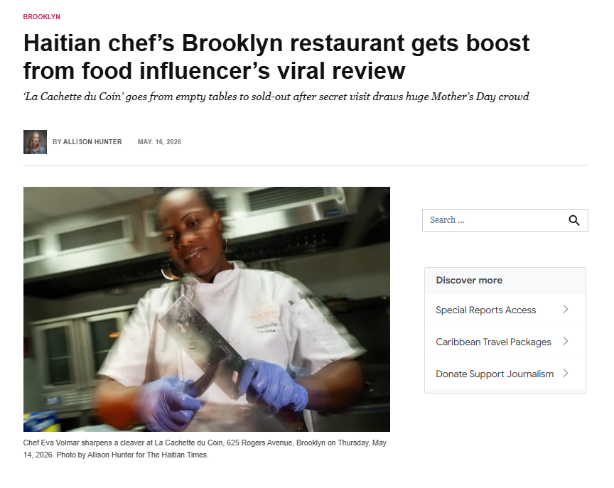 Chef Eva Volmar in a white chef's coat and blue latex gloves sharpens a cleaver in the kitchen of La Cachette du Coin restaurant in Brooklyn, Thursday, May 14, 2026.